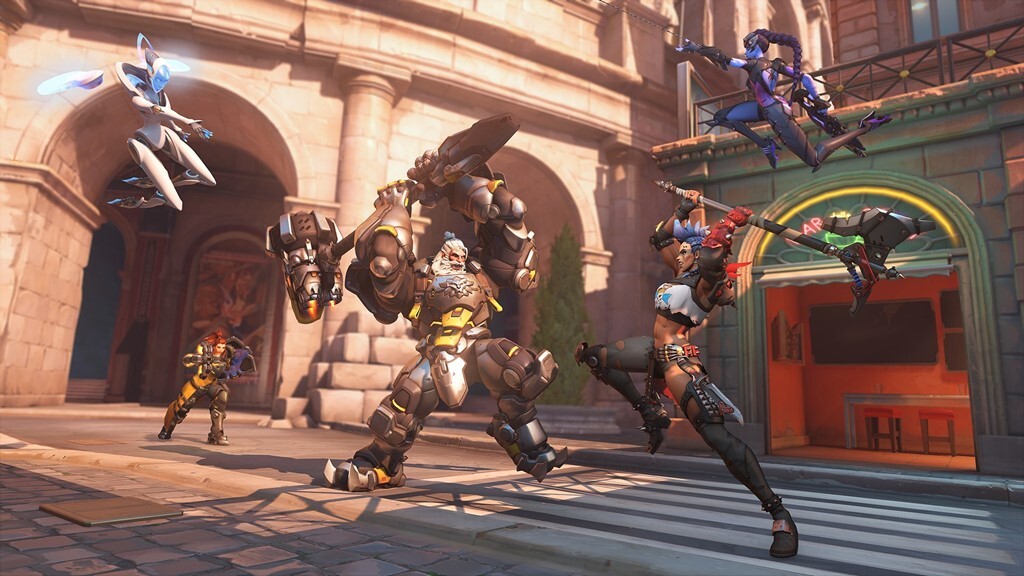 Overwatch heroes in battle.